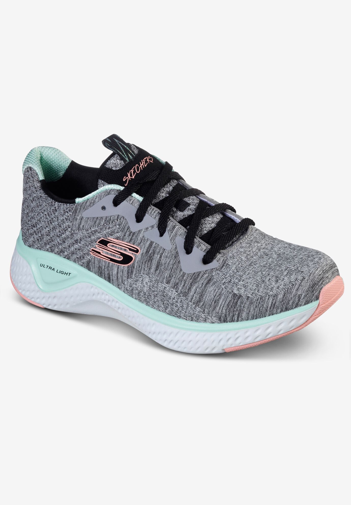 woman within skechers